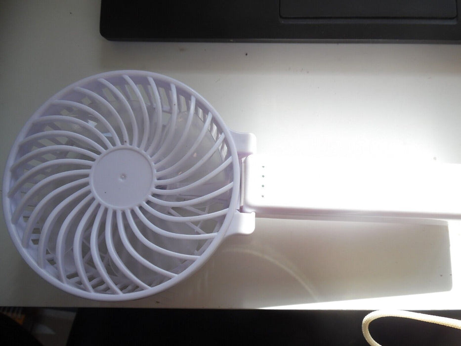White Handheld battery operated Fan