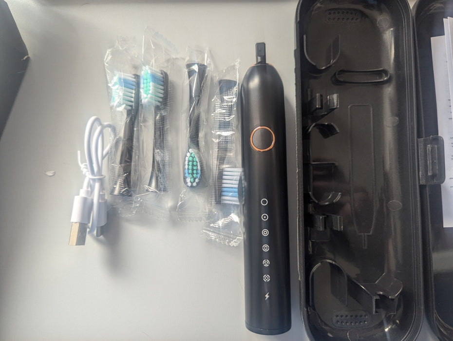 Electric Toothbrush with 4 heads charger lead and case