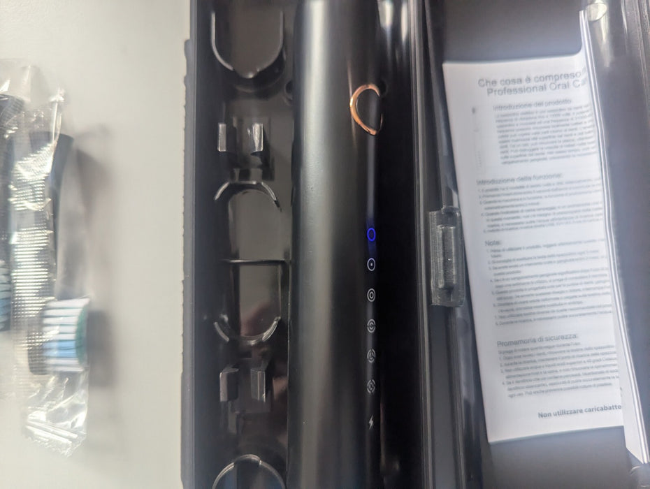 Electric Toothbrush with 4 heads charger lead and case