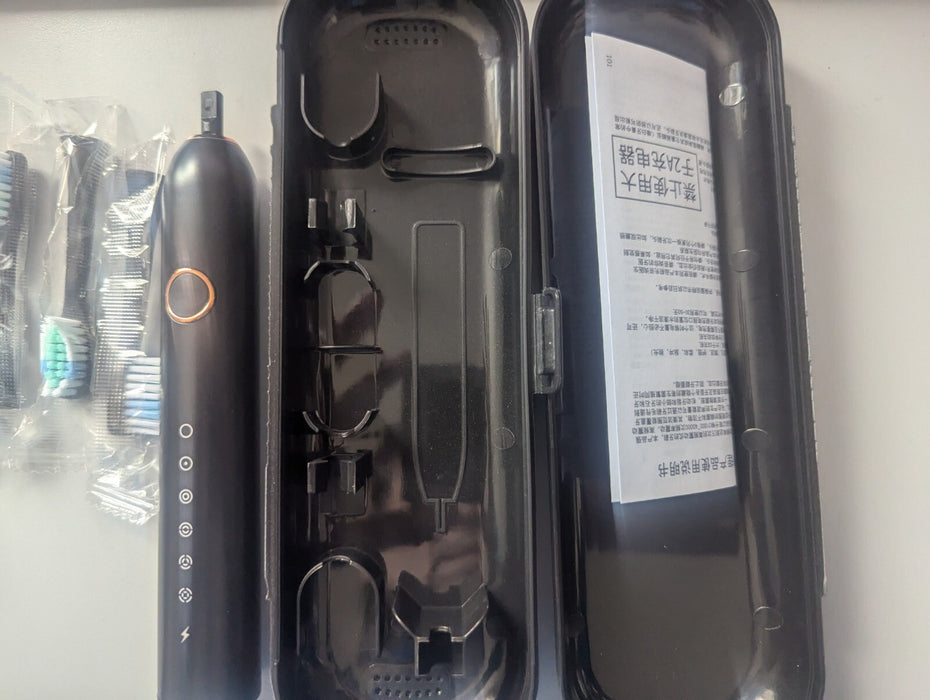 Electric Toothbrush with 4 heads charger lead and case